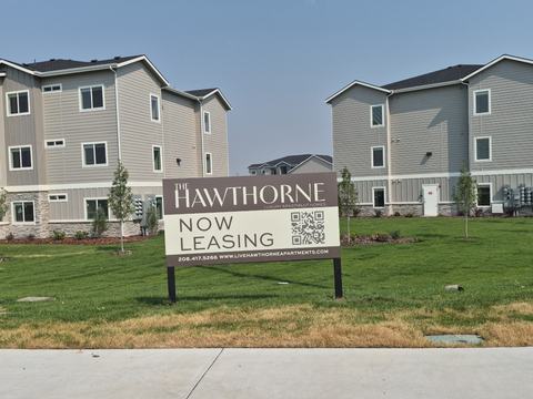 Hawthorne Now Leasing ACM sign face mounted on posts