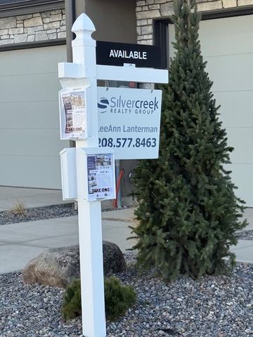 Silvercreek listing sign with AVAILABLE rider and brochure boxes on a white post