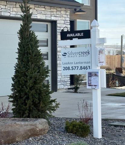 White vinyl post with AVAILABLE rider, listing panel and flyer boxes