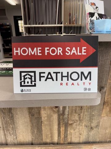 Fathom Realty Home For Sale directional sign